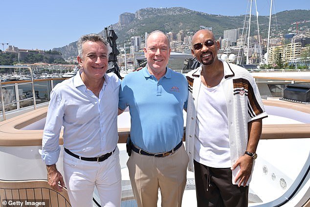 He posed for pictures with such high-flyers as Monaco