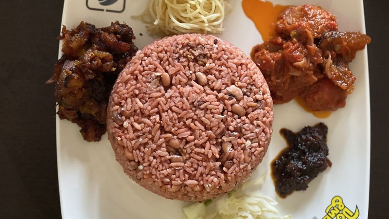 Waakye served with kelewele, spaghetti, salad, stew and shito